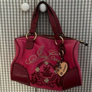 Rare Juicy Couture pink purse! In great condition! No signs of wear!